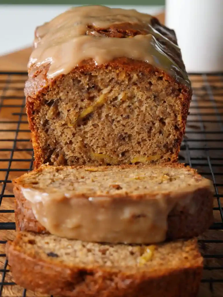 Whole banana bread loaf topped with coffee glaze
