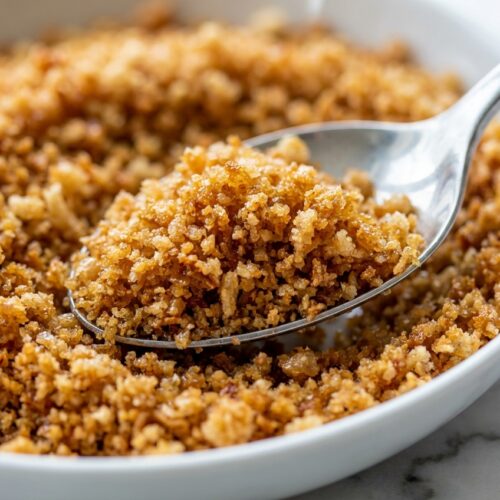 Golden brown butter breadcrumbs recipe toasted to a crispy finish in a cast iron skillet.
