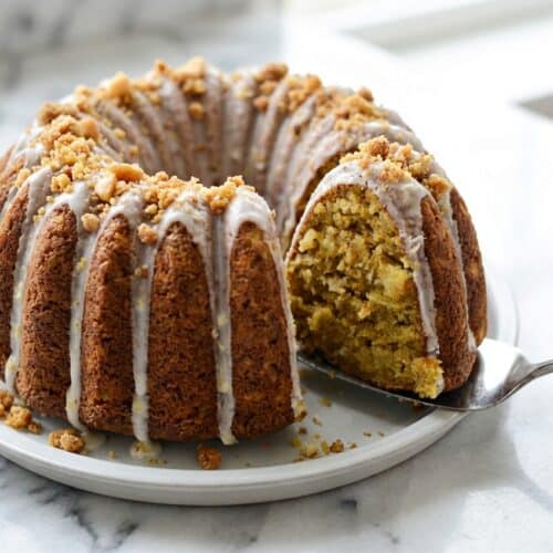 Hawaiian carrot pineapple cake with cream cheese frosting and a toasted brown butter macadamia nut crumble.