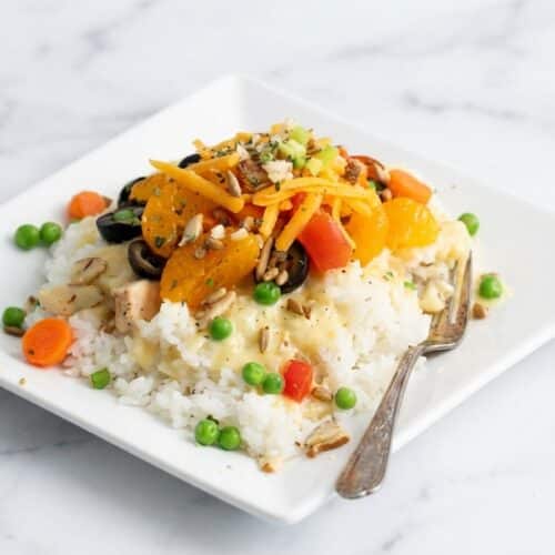 Tasty Tuesday Hawaiian haystacks over coconut-lime rice with toasted macadamia nuts and mandarin oranges.