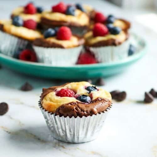 Fudgy blintz brownie bites with a creamy brown butter cheese swirl and fresh lemon zest.