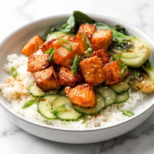 Crispy air fried salmon bites with a cornstarch crunch and a glossy hot honey glaze.