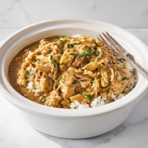 Creamy crockpot chicken and gravy with a savory umami-herb finish of sage and Worcestershire sauce.