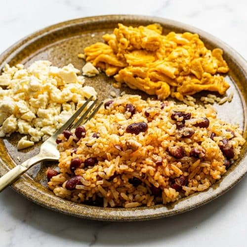 Achiote-infused gallo pinto with crispy double-fried rice grains and savory black beans.