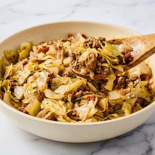 Sautéed ground beef and cabbage in a skillet with a tangy apple cider vinegar and Worcestershire sauce deglaze.