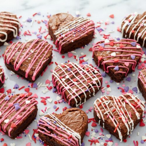 Rich heart shaped brownies featuring the flavor-enhancing brown butter and sea salt bloom technique.