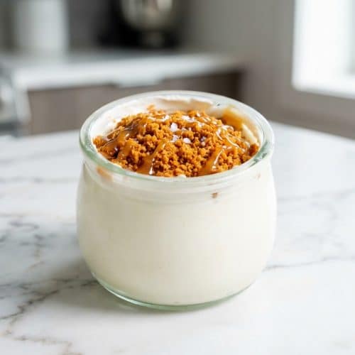 Creamy Japanese Yogurt Cheesecake featuring a glossy Miso-Maple salted glaze on a Biscoff crust.