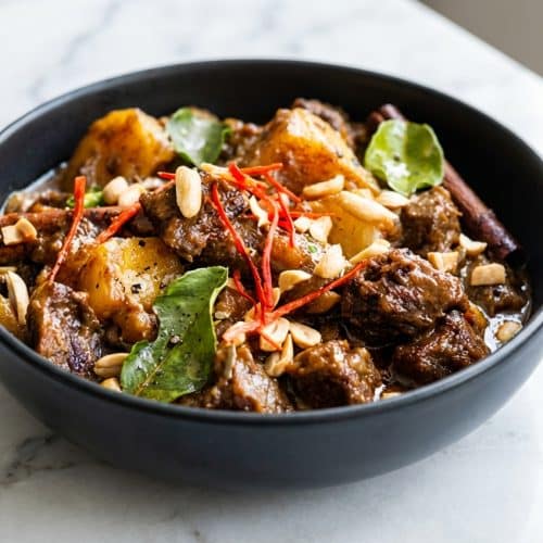 Rich massaman curry recipe with tender beef chuck developed using the double-fat searing technique.