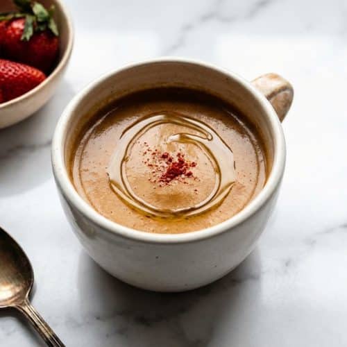 Frothy mushroom coffee recipe for weight loss with creamy MCT oil and a metabolic pinch of cayenne pepper.