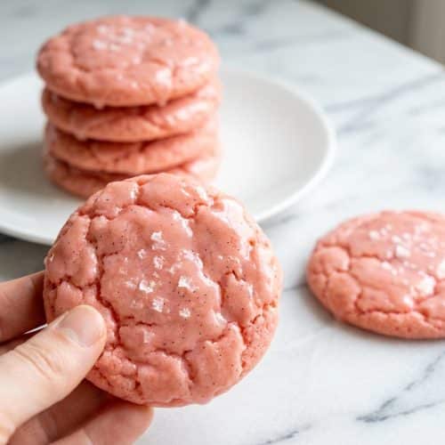 Soft strawberry cake mix cookies with white chocolate chips, enhanced with vanilla and a pinch of sea salt.