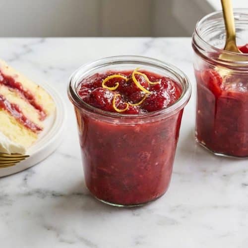 Glossy strawberry cake filling flecked with vanilla bean paste and fresh lemon zest for a triple-threat flavor boost.