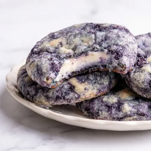 Blueberry Cheesecake Cookies with wild blueberry reduction and a buttery graham cracker crust bottom.