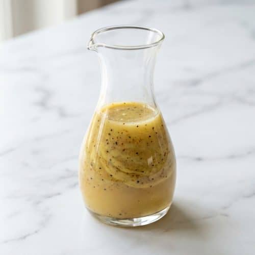 Calamansi Vinaigrette drizzled over a fresh salad, made with smooth Dijon mustard and mild rice vinegar for a balanced tang.