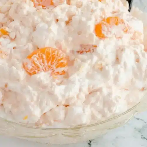 Creamy Cottage Cheese Jello Salad in a bowl, made with half-blended cottage cheese for a smoother, fluffier texture.