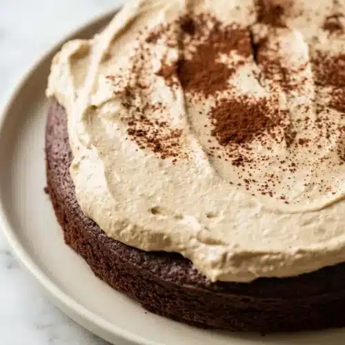 Fudgy Dalgona Coffee Brownies with a rich brown butter base, topped with a thick, stabilized mascarpone whipped coffee layer.