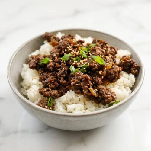 Ground Beef Bulgogi Bowls with a crispy hard sear and sweet Asian pear sauce served over fluffy rice.