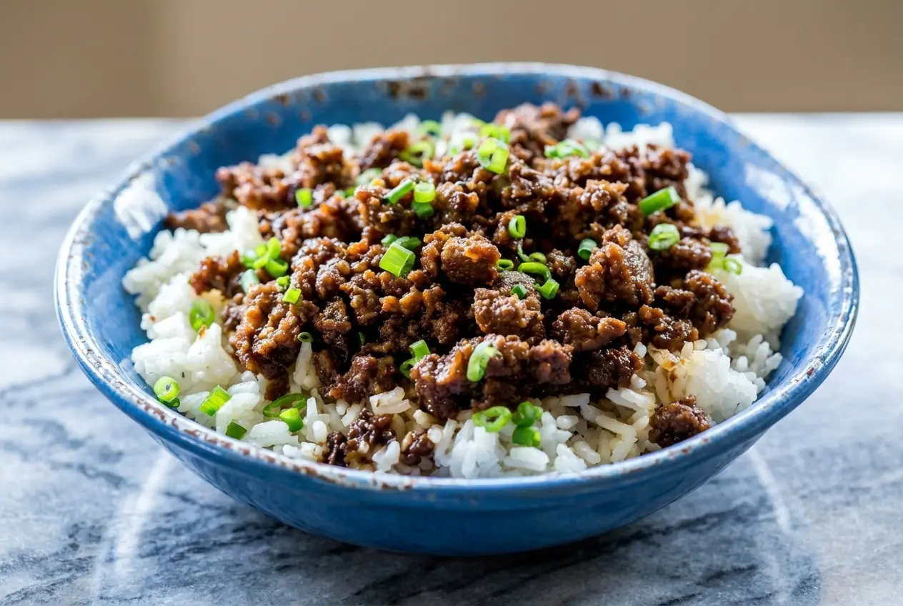 Savory Korean Ground Beef Bowl with a glossy gochujang-honey caramelized glaze served over fluffy jasmine rice.