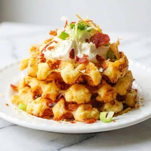 Golden Potato Waffles with a crunchy crust thanks to added instant potato flakes in the batter.