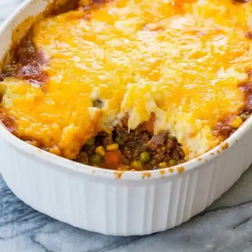 Shepherd's Pie Casserole featuring a rich smoked paprika base and a golden mashed potato crust.