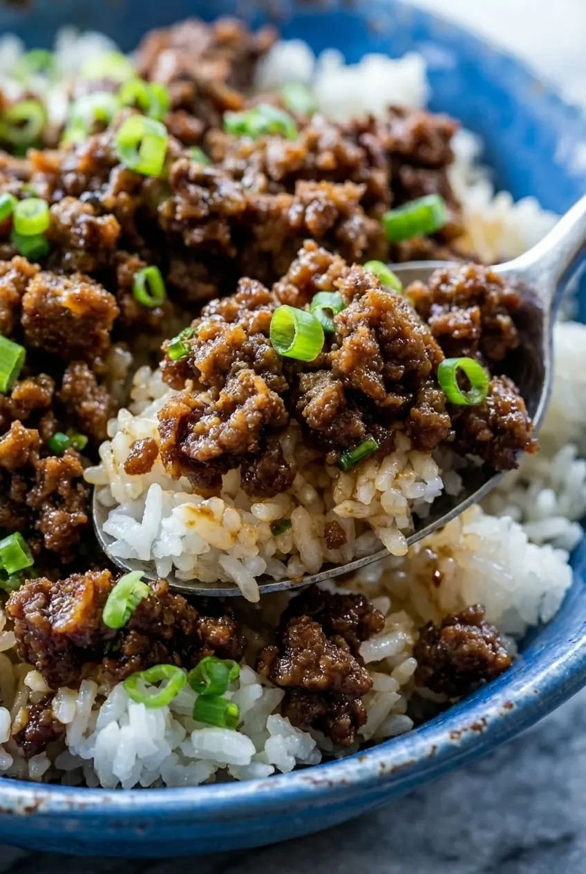 Close-up of caramelized Korean Ground Beef Bowl showing the rich Maillard reaction and sticky gochujang-honey glaze.