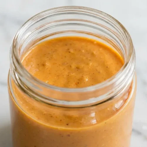Creamy tram sauce recipe made with rich Kewpie mayonnaise and palm sugar in a small dipping bowl.