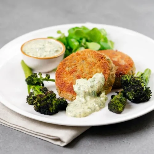 Golden crispy tinned mackerel fish cakes with a textured herb and fennel seed crumb coating.