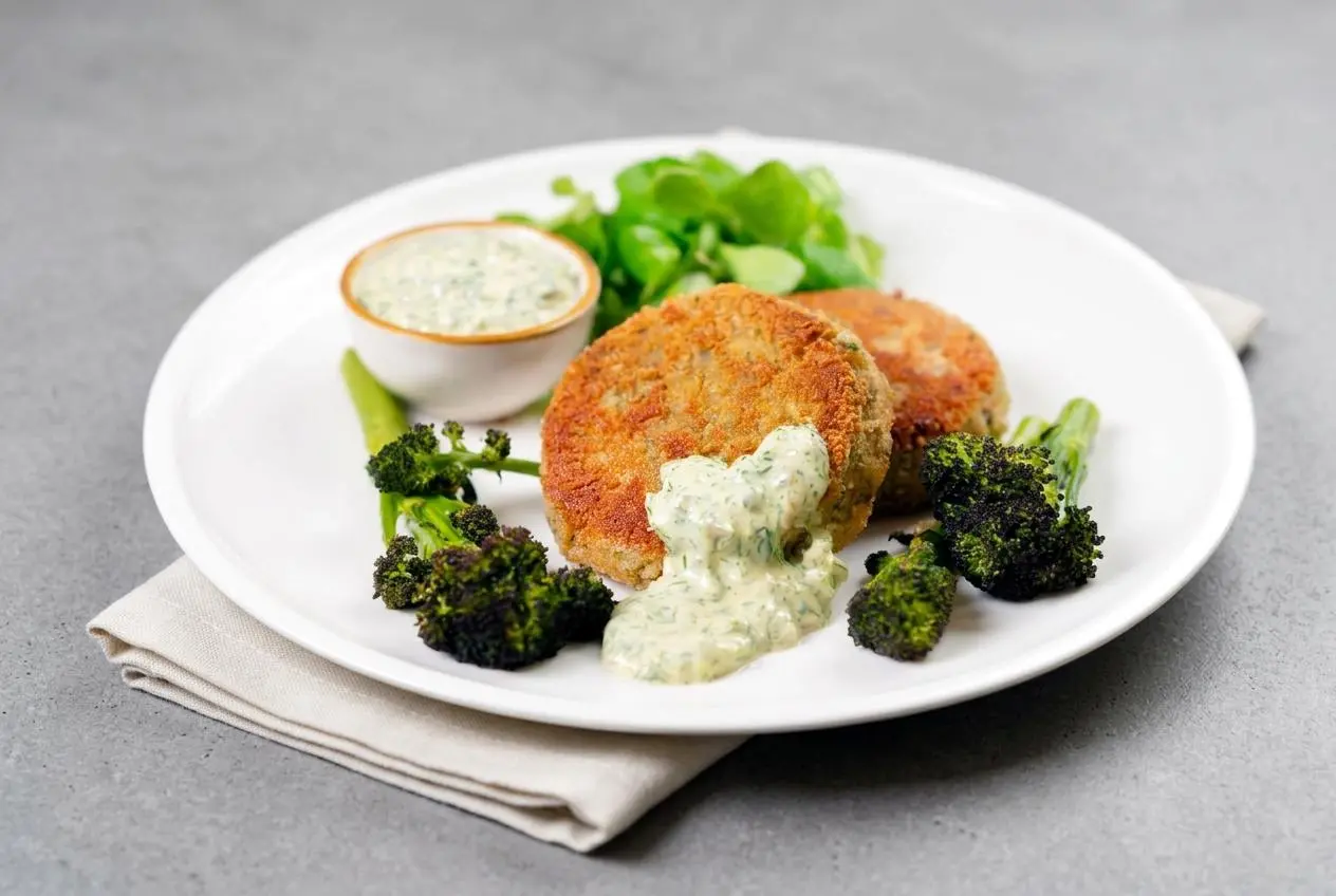 Golden crispy tinned mackerel fish cakes with a textured herb and fennel seed crumb coating.