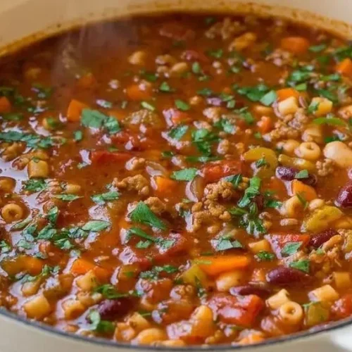 Hearty pasta e fagioli soup with tender ditalini pasta, two beans, and a rich herb tomato broth.