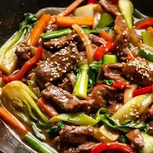 Savory beef stir fry recipe with tender steak, crisp vegetables, and a glossy soy oyster sauce glaze.