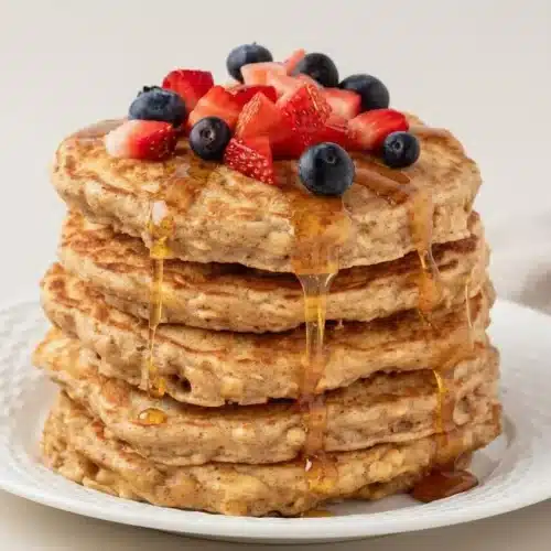 Fluffy stack made from this oatmeal pancakes recipe with golden toasted edges and warm vanilla aroma.