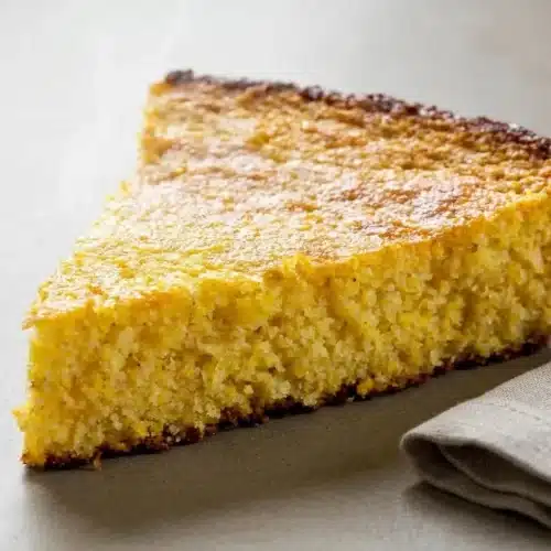 Golden skillet gluten free cornbread recipe with crisp browned edges and a tender buttery crumb.