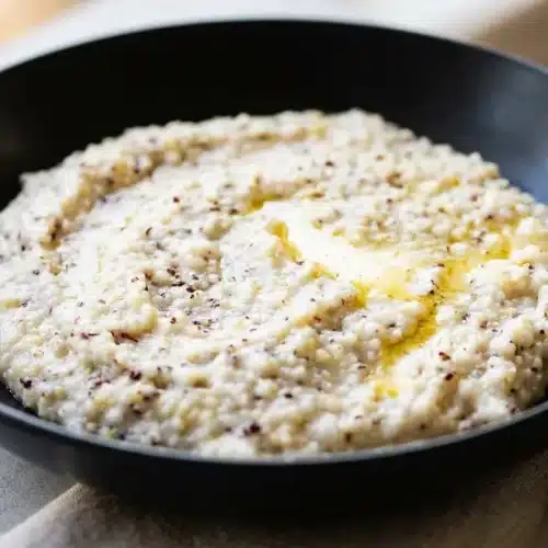 How To Make Grits with a velvety, creamy finish topped with melted golden butter.