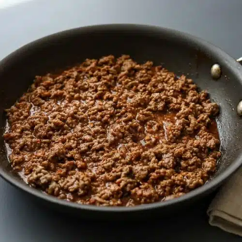 Taco meat recipe featuring savory ground meat simmered to a moist, glossy finish with warm spices.