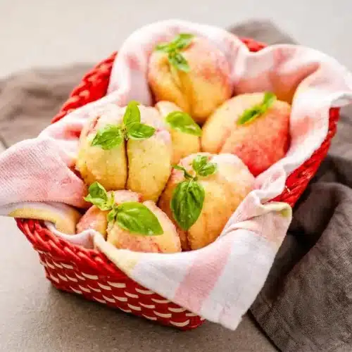 italian peach cookies finished dish with a golden topping
